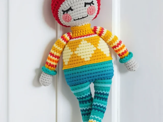 Image showing Colorful crocheted doll