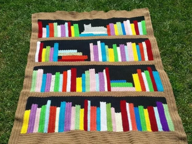 Image showing Crochet Blanket Library bookshelf blanket on green grass